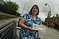 Janet Brooks, Senior Project Officer for RDA shows off the Green Apple Environment Award at the Townhead development