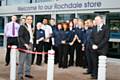 The Mayor of Rochdale, Councillor Zulfiqar Ali cuts the ribbon to the new PC World and Currys store in Rochdale