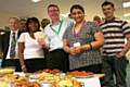 Sadia Dar, Simon Bailey and Debbie Ravey with staff who raised over £250 for charity in their lunch break