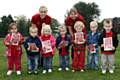 Young children and play leaders at Syke Community Preschool Playgroup are appealing to dog owners to pick up dog poo so they can play outside safely