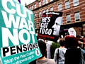 Members of the Peace Group with a 'Cut War not Pensions placard in the march 