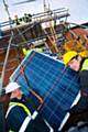 Arthur Cranfield (left) and Alan Ronan get to grips with the solar panels
