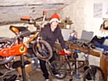 Toby Werhun, volunteer, with some of the bikes that are being brought back to life