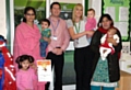 Parent Mumtaz Yousaf with Khadija Yousaf & Mohammed Eisa, Andrew Forrest Oral health Promotion manager, Paula Marshall Early Years Co-ordinator with Imogen Belfield and Shazia Parveen with Liaba Arshad

