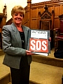 Councillor Ashworth with the petition folder