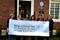 Michelle Green and Karen Humphrey (right) presenting the cheque to the Borough of Rochdale Fund