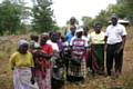 A few of the women from the community with two Meru Rotarians 