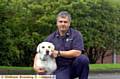 Echo the labrador with his handler fire-fighter Mike Dewar