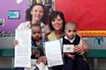 Celebration: Michelle Clayton, Senior Early Years Worker, Emma Davies, Early Years Worker with children Haris Azhar and Adam Hussain
