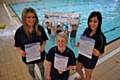 Stascha Redkwa, James Lord, Iqra Waheed with swimming club members