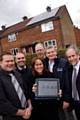 Partners at Retrofit house with monitoring software - Phil Treaton (Groundwork), Barry Simons (Rochdale Council), Teresa Jennings (Groundwork), John Hall (AlternEnergy), Andy Moloney (AlternEnergy), Paul Roberts (Rochdale Council). 
