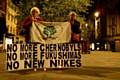 Littleborough residents, Mai Chatham and Rae Street holding the Peace Group banner over a placard reading 'No More Chernobyls. No More Fukushimas. No New Nukes.'