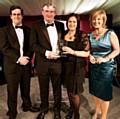 Jackson, Jackson & Sons collects the SME of the year award from Lucy Meacock at the Regional Construction Awards