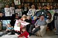 Some of those present with ‘Cut Trident not jobs, health, education’ placards and some of the group’s banners