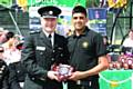 Summander Hussain receiving an award at the annual UPS Passing Out Parade last summer