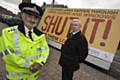 Chief Inspector Mir and Crime Reduction Adviser Brian Farr with an ad van being used to promote home security

