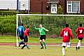 Asif Khan lobs the Police keeper for the opening goal<br \>Annual Alliance Football Match<br \>
Police (Rochdale Division) versus Sport for All