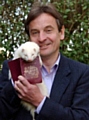 Chris Davies MEP with a ferret and Chris’s passport