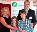 Paul Gordziejewicz, Head of the Rochdale Home Improvement Agency, celebrates the award with his wife Angela, son George and daughter Anastazia.