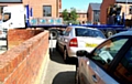 Cars parked on the pavement