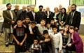 Young people with Mayor Godson at the celebration event. 