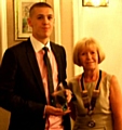 Jason Gregory accepting the award from Middleton Rotary Club president Janice Powell 