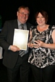 Previous winners of Club of the Year Award -  Rochdale FC Chairman Chris Dunphy presenting the Club of the Year Award to a representative from the Rochdale Company of Archers