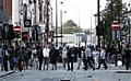 Crowds gather on Oldham Street during Manchester’s looting shame. Picture courtesy Press Association 
