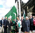 Dignitaries join with Ghulam Rasul Shahzad for the flag raising ceremony 
