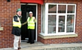 Councillor Pat Colclugh and Councillor Dale Mulgrew at the site on Romney Avenue of the first new houses being built under the Kirkholt regeneration programme ‘Vision for Kirkholt’ re-using brownfield land 