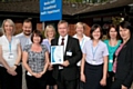 Pennine Acute Trust’s occupational health team proudly displays their SEQOHS certificate of accreditation