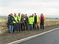 Residents, officers from the Impact Partnership, the Director of Bethel, members of the workforce and Councillor Metcalfe stood in front of the new wall. 
