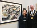 The Mayor with young artist Imogen D’Roza and her mixed media artwork ‘When the Boat Comes In’. Imogen, 19, is now at University studying Graphic Design having originally come to Touchstones Rochdale on work experience and hopes for a future career in the industry. With both parents art teachers, creativity could be described as being in her genes