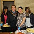 Lower Falinge Activity Group volunteers Marcelha da Silva and Maha Saoud with Deputy Mayor of Rochdale Councillor Peter Rush and RBH Community Action Worker Khalida Crossley