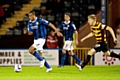 Rhys Bennett playing for Rochdale v Bradford City