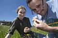 Stuart Hedley (foreground), the Watershed Landscape project botanist, and Katie Quantrell, Watershed Landscape project apprentice, conducting grassland species identification in the South Pennines