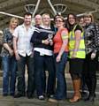 'Cycling Champion’ and Littleborough resident, Caroline Muldowney, is pictured with her TfGM cycling trophy and colleagues