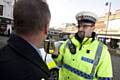 Police officer carrying out breath test