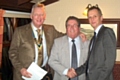 Rotary Club of Heywood President Grant Bargh and proposer Peter Rush with Chris Duffy 
