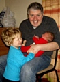 Councillor Mulgrew with his son Tristan and new baby daughter Lorelai