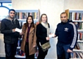 Mohammed Nadeem and Masoon Elahi from AGG handing the grants to Keri Aldritt and Farhana Naz