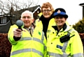 Resident Ron Horton, holding the recording equipment, alongside Councillor Irene Davidson and PCSO Angela Smith 