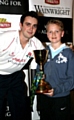 A cricket fan with Stephen Parry and the County Championship Trophy