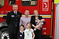 CFO Steve McQuirk with Craig Berrisford and his wife Joanne, baby daughter Elsie-Jo, Annalise, aged 9 (holding the certificate), and Sienna, aged 6.