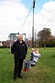 Councillor Pat Colclough with local young Kirkholt resident Leyton Ramsden from Kildare Crescent at the Zip Wire at Balderstone Park