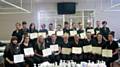 Image students with their certificates