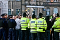 Demonstrators surrounded by police 