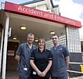 Dr Tom Leckie, Julie Winterbottom and Dr Nick Gili outside the A&E department at The Royal Oldham Hospital 