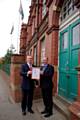 Groundwork staff member Mike Beere and Executive Director Cliff Ellison with the certificate