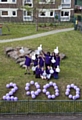 The RBH Junior Wardens, a youth based community project at Lower Falinge help spell out the 2000 member message